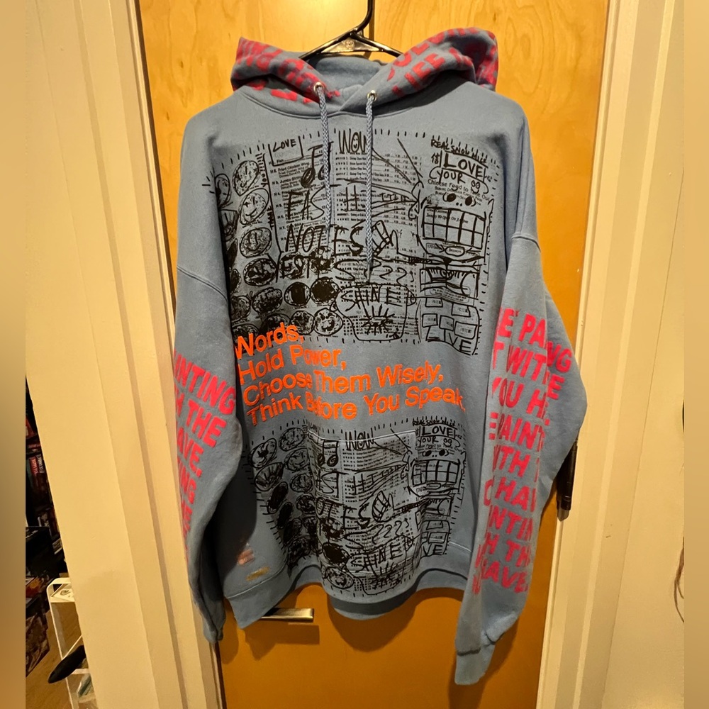 NWOT Snow Milk Sky Blue Hoodie with Graphic Print